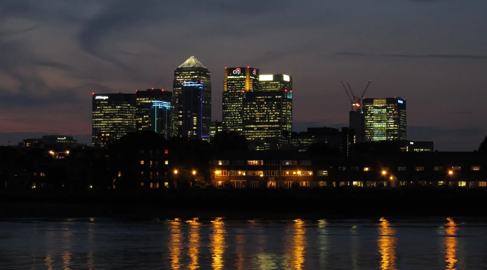Canary Wharf's financial district at dusk, seen across the Thames from Greenwich.